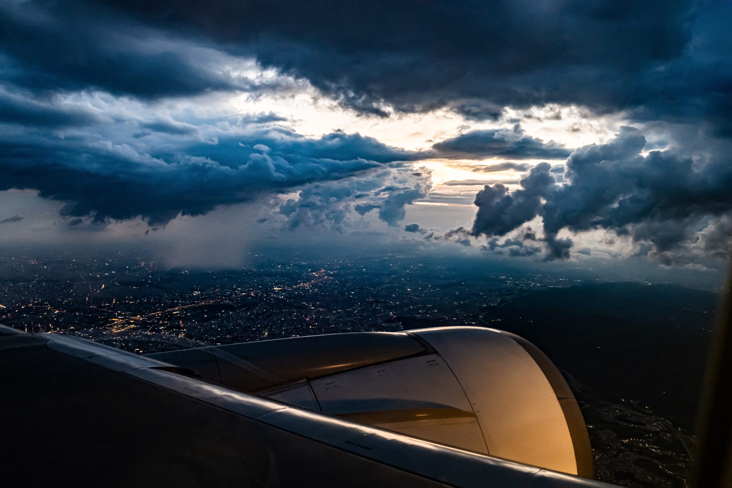 Airplane flying in stormy skies