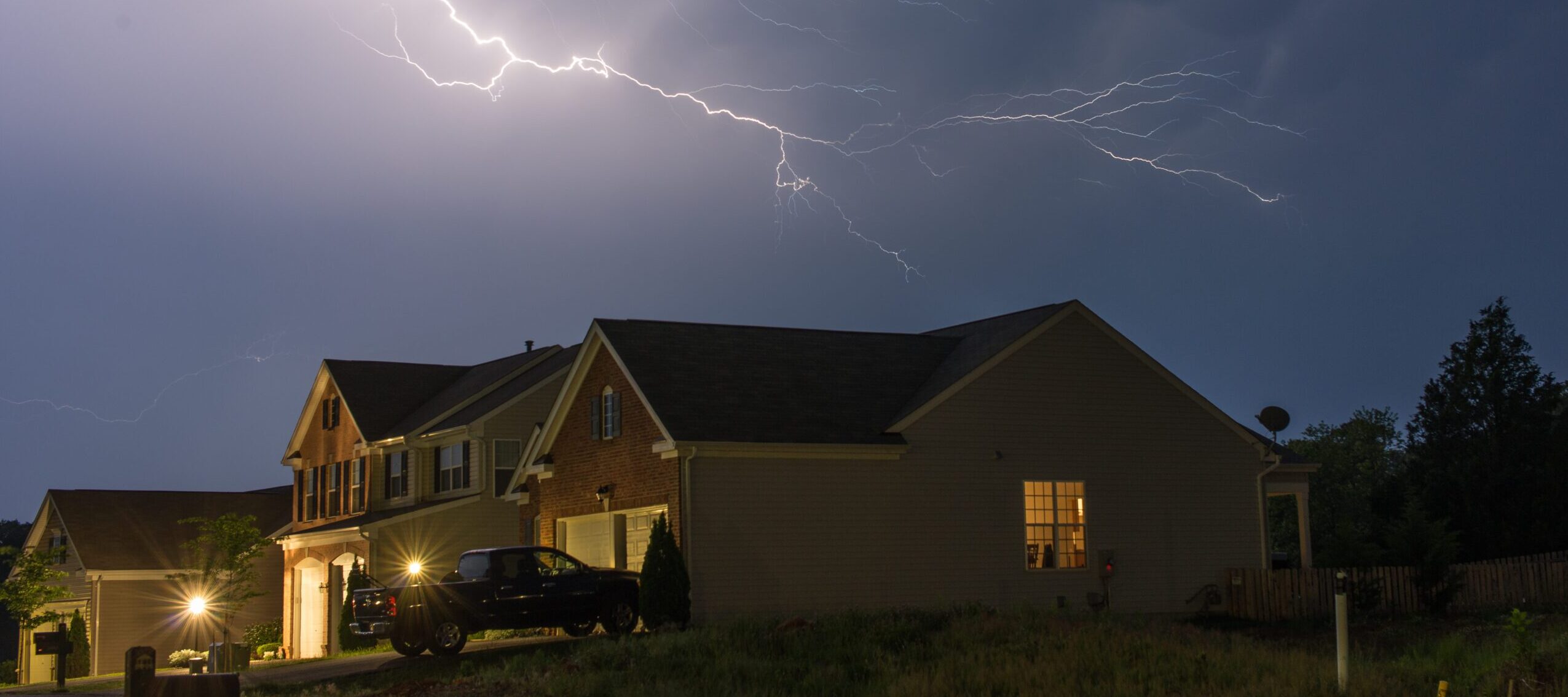 House in a severe thunder and lightning storm.